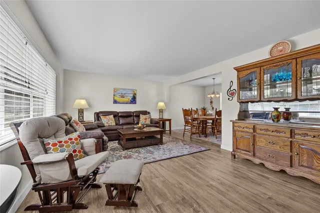 a bed room with furniture and a window