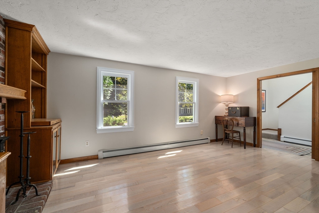 15 Mockingbird Lane Maynard, MA 01754 - Photo 14 of 31 a living room with furniture and a window