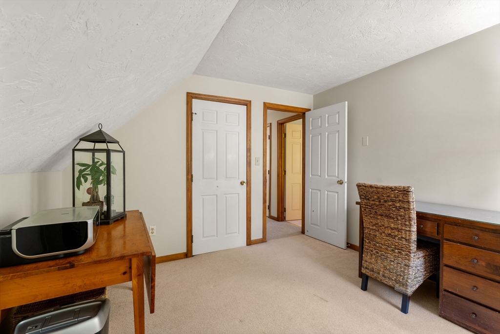 15 Mockingbird Lane Maynard, MA 01754 - Photo 20 of 31 a view of livingroom with furniture and workspace