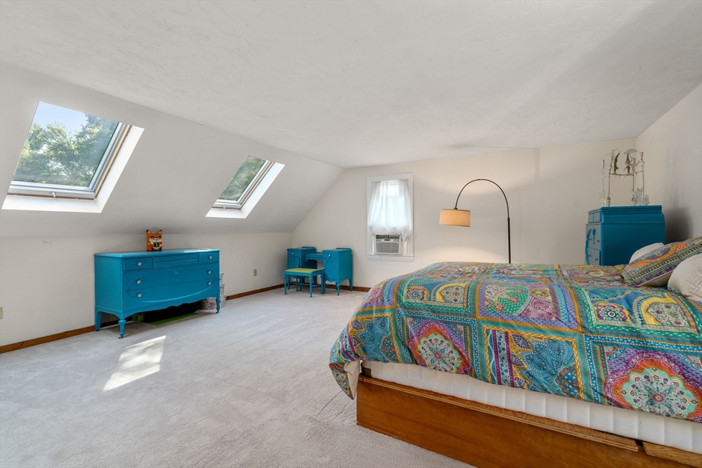 15 Mockingbird Lane Maynard, MA 01754 - Photo 25 of 31 a bedroom with bed and a window