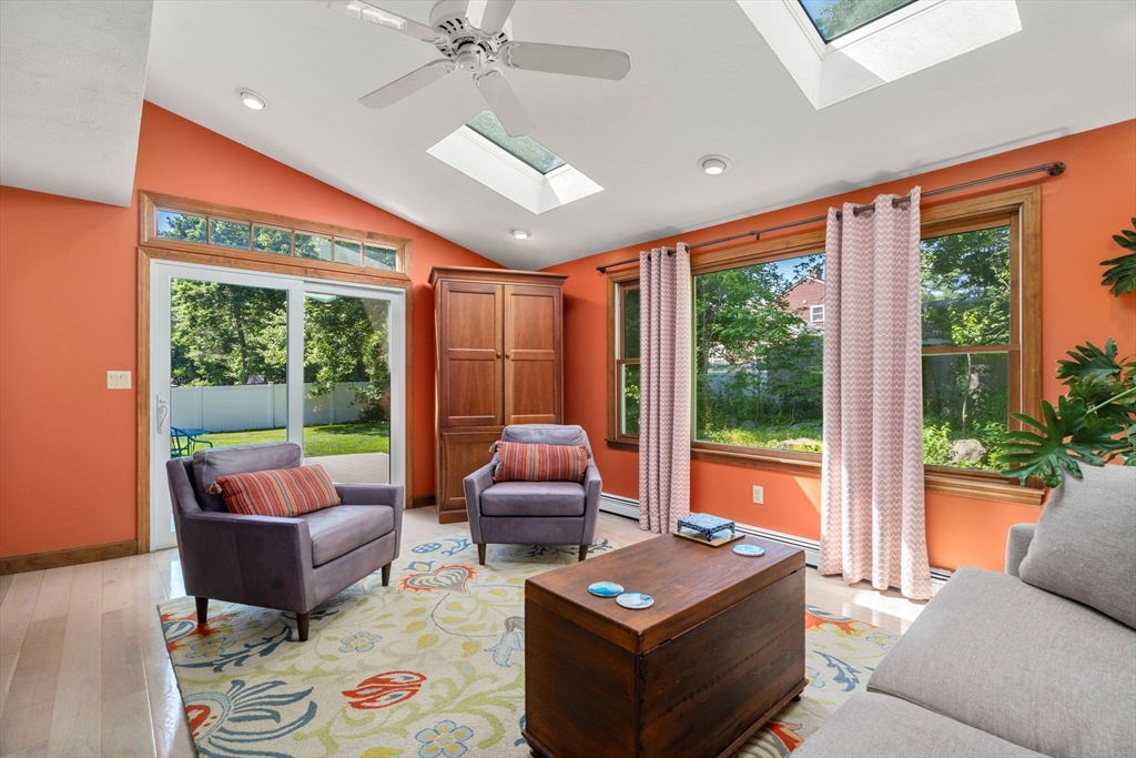 15 Mockingbird Lane Maynard, MA 01754 - Photo 3 of 31 a living room with furniture and a floor to ceiling window