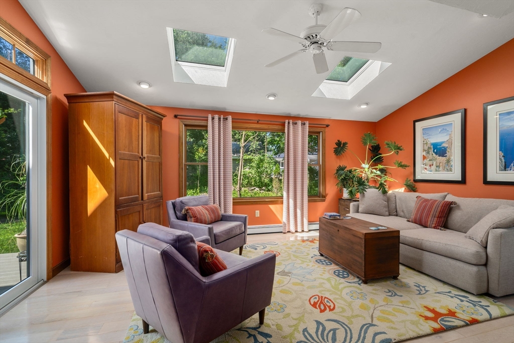 15 Mockingbird Lane Maynard, MA 01754 - Photo 5 of 31 a living room with furniture ceiling fan and a window