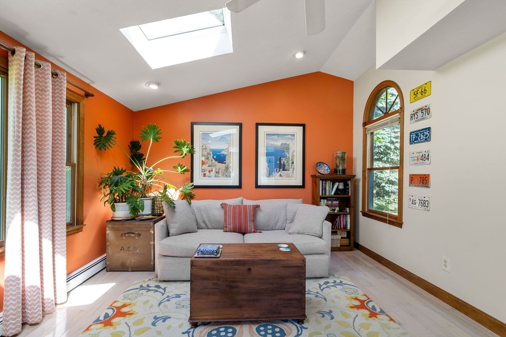 15 Mockingbird Lane Maynard, MA 01754 - Photo 7 of 31 a living room with a couch and a window