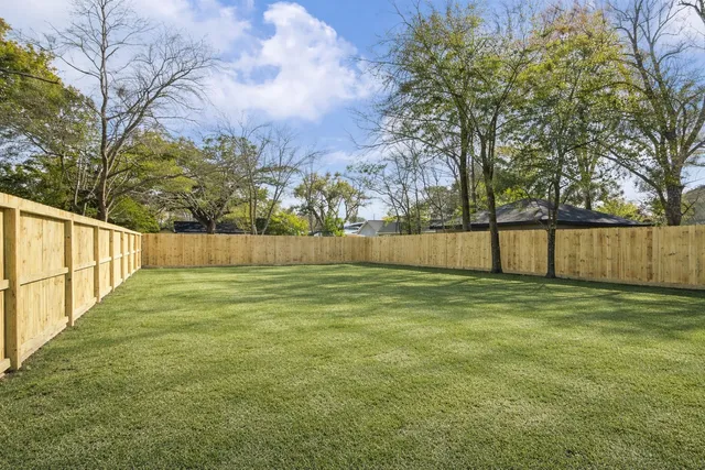 a view of a yard with a slide