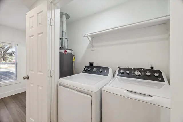 a utility room with dryer and washer
