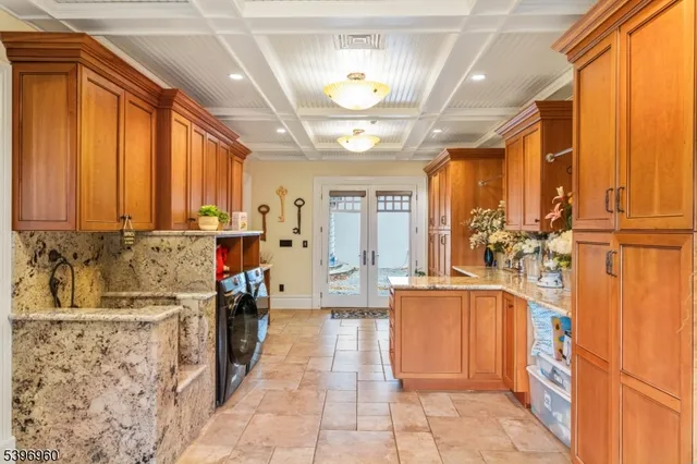 a view of entryway with an entryway and wooden floor