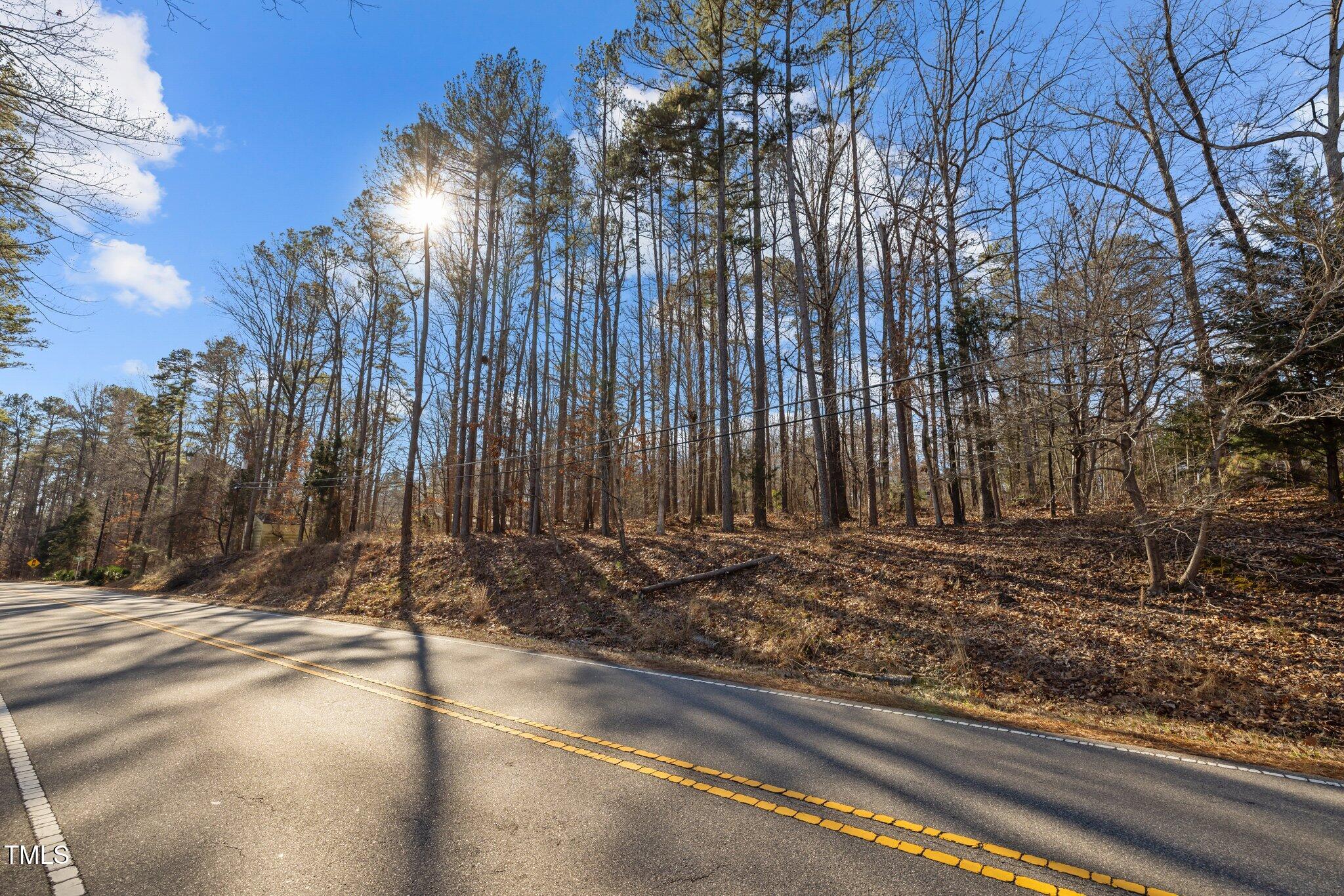 3207 West Cornwallis Road Durham, NC 27705 - Photo 2 of 11 a view of a street with a building