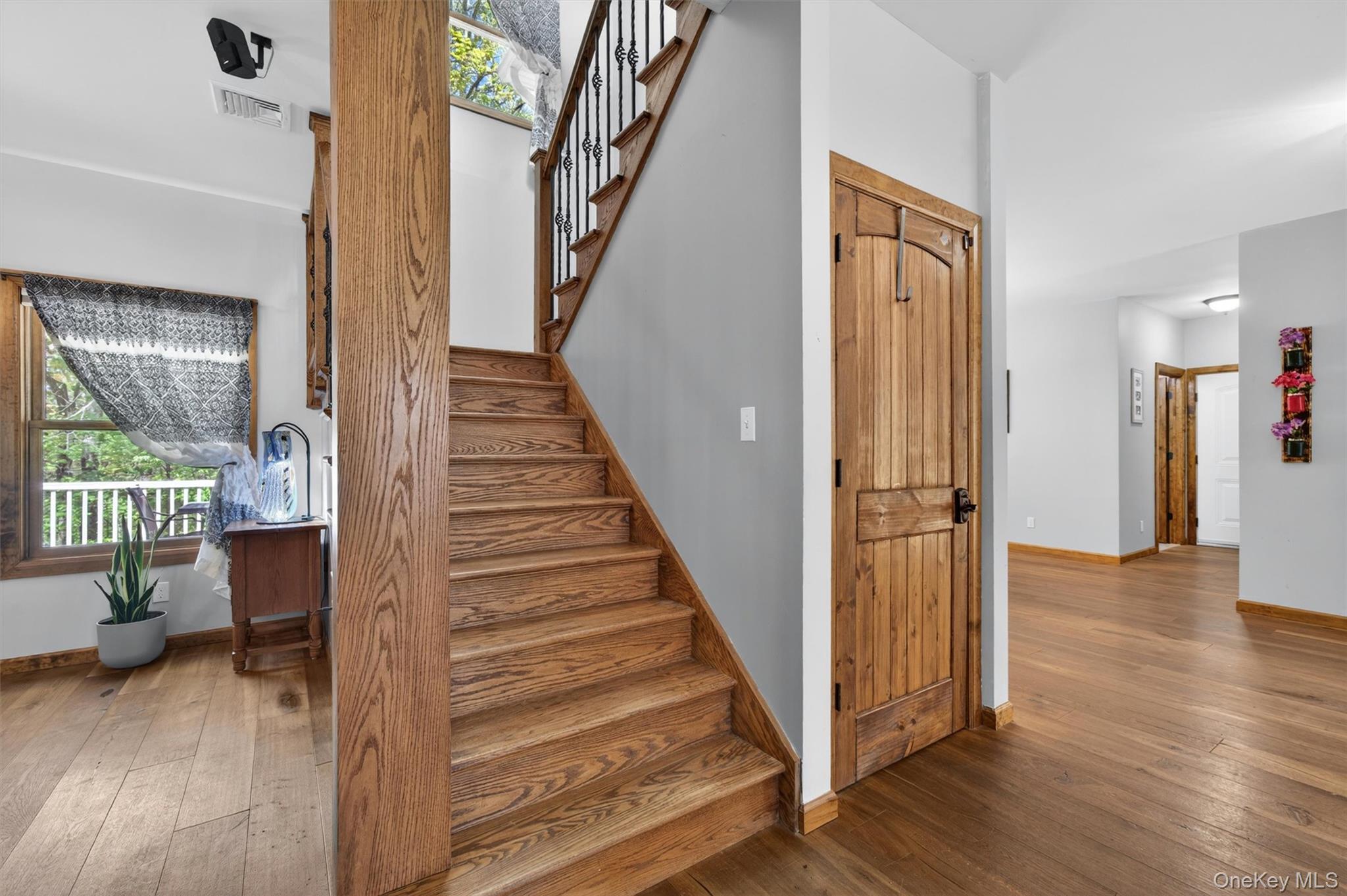 2 White Horse Road Middletown, NY 10940 - Photo 21 of 47 A beautifully positioned central staircase provides an elegant transition from the main level to the second floor.