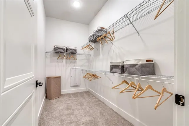 a view of storage and utility room with washer and dryer