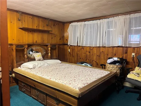 a kitchen with kitchen island a sink table and chairs