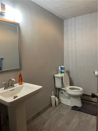 a bathroom with a sink and a toilet