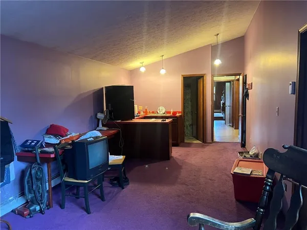 a workspace with furniture and mirror