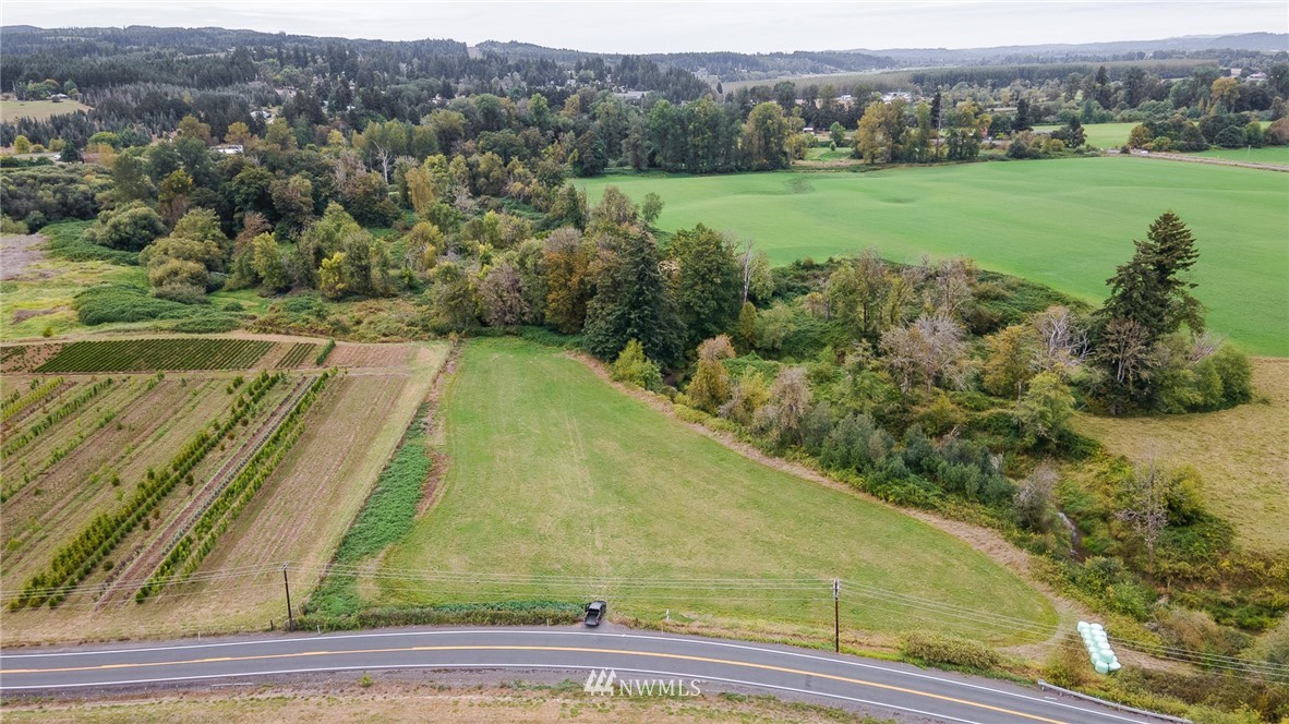 0 Twin Oaks Road Chehalis, WA 98532 - Photo 22 of 24 an aerial view of residential houses with outdoor space and trees