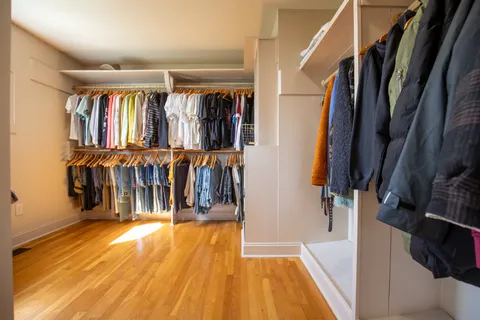 a view of a garage with wooden walls