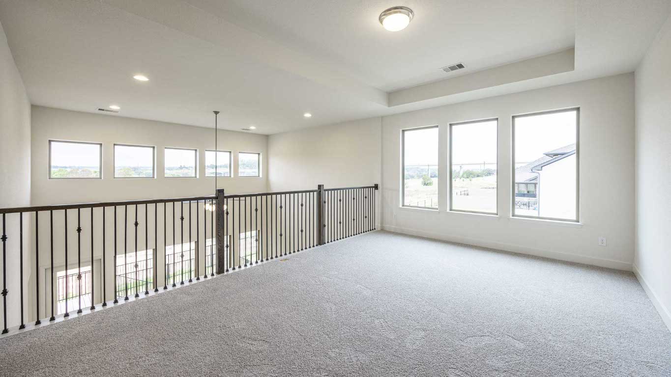 1517 Rodeo Ridge Drive Georgetown, TX 78628 - Photo 12 of 39 an empty room with windows