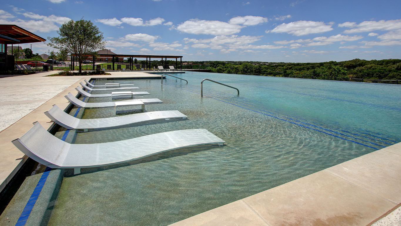 1517 Rodeo Ridge Drive Georgetown, TX 78628 - Photo 18 of 39 a view of a swimming pool with lake and mountain view