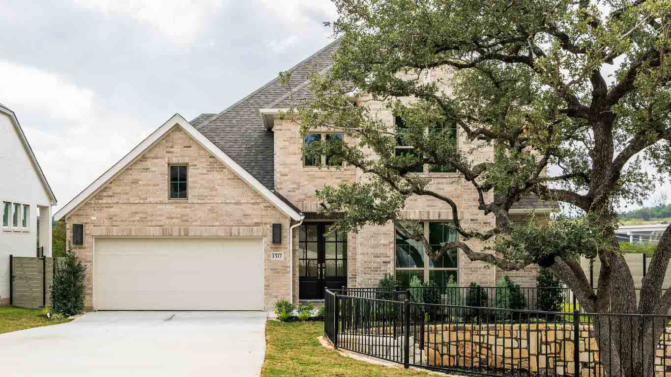 1517 Rodeo Ridge Drive Georgetown, TX 78628 - Photo 2 of 39 a view of a house with a iron stairs