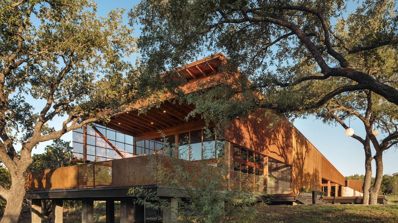 1517 Rodeo Ridge Drive Georgetown, TX 78628 - Photo 38 of 39 a backyard of a house with barbeque oven and large trees