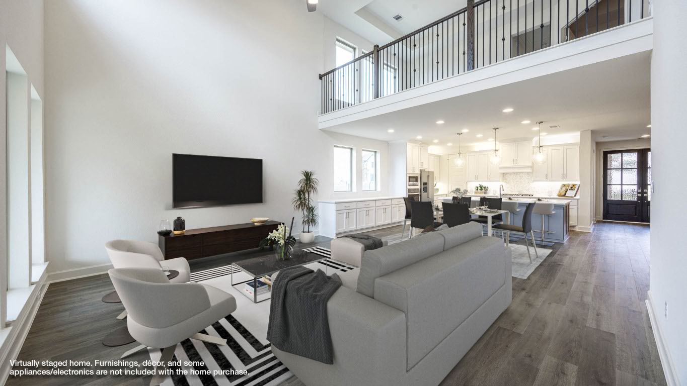 1517 Rodeo Ridge Drive Georgetown, TX 78628 - Photo 4 of 39 a living room with furniture and a flat screen tv