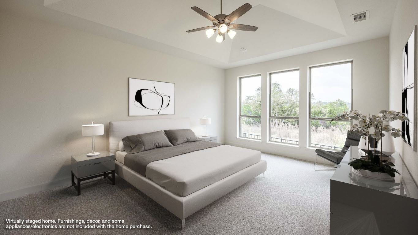 1517 Rodeo Ridge Drive Georgetown, TX 78628 - Photo 5 of 39 a spacious bedroom with a bed and a large window