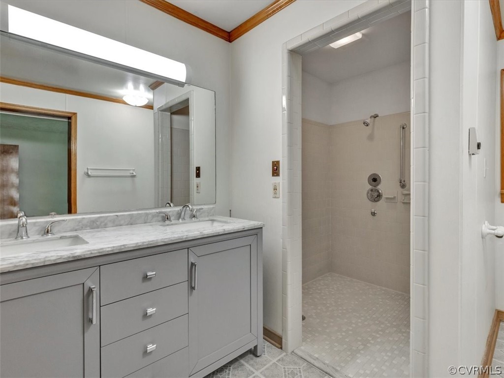 8801 Belmont Road Chesterfield, VA 23832 - Photo 19 of 24 a bathroom with a granite countertop sink mirror and double