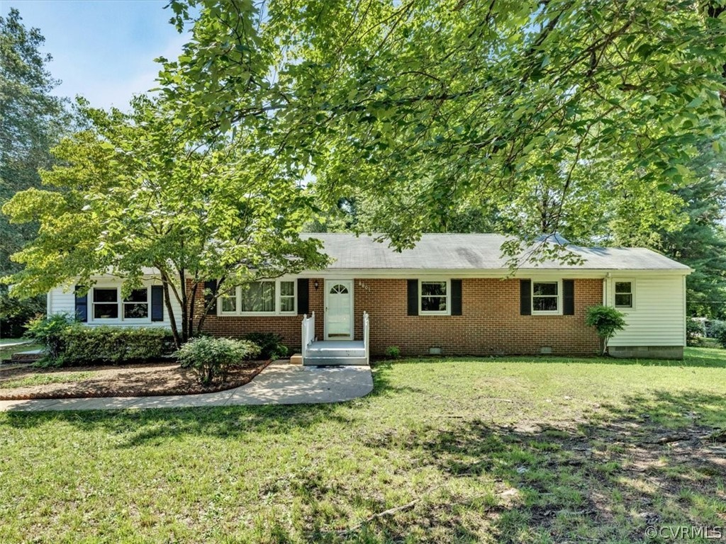 8801 Belmont Road Chesterfield, VA 23832 - Photo 2 of 24 a house that has a tree in front of the house