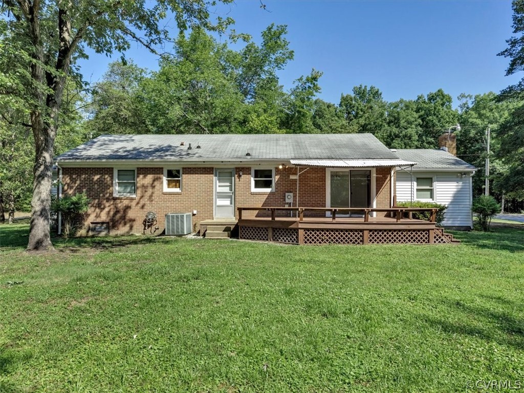 8801 Belmont Road Chesterfield, VA 23832 - Photo 23 of 24 a front view of a house with a garden