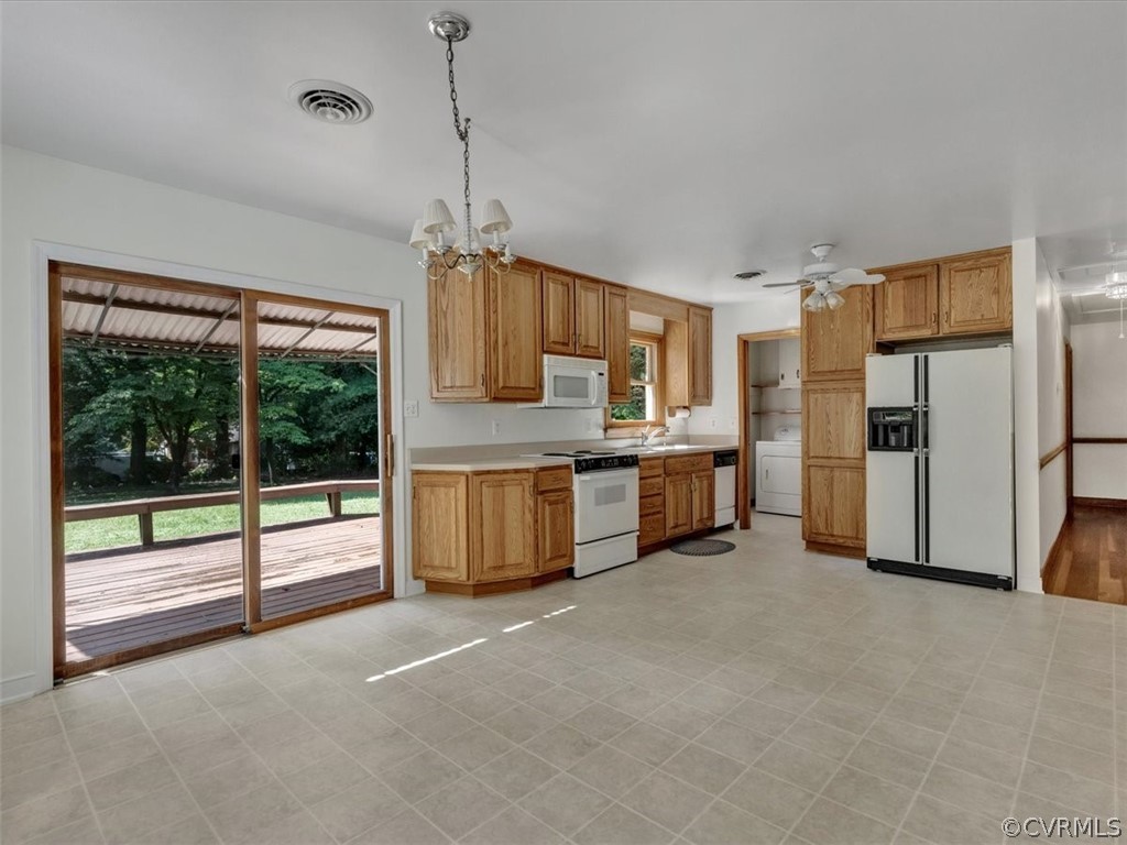 8801 Belmont Road Chesterfield, VA 23832 - Photo 7 of 24 a large kitchen with stainless steel appliances granite countertop a refrigerator a oven and a sink with granite countertops