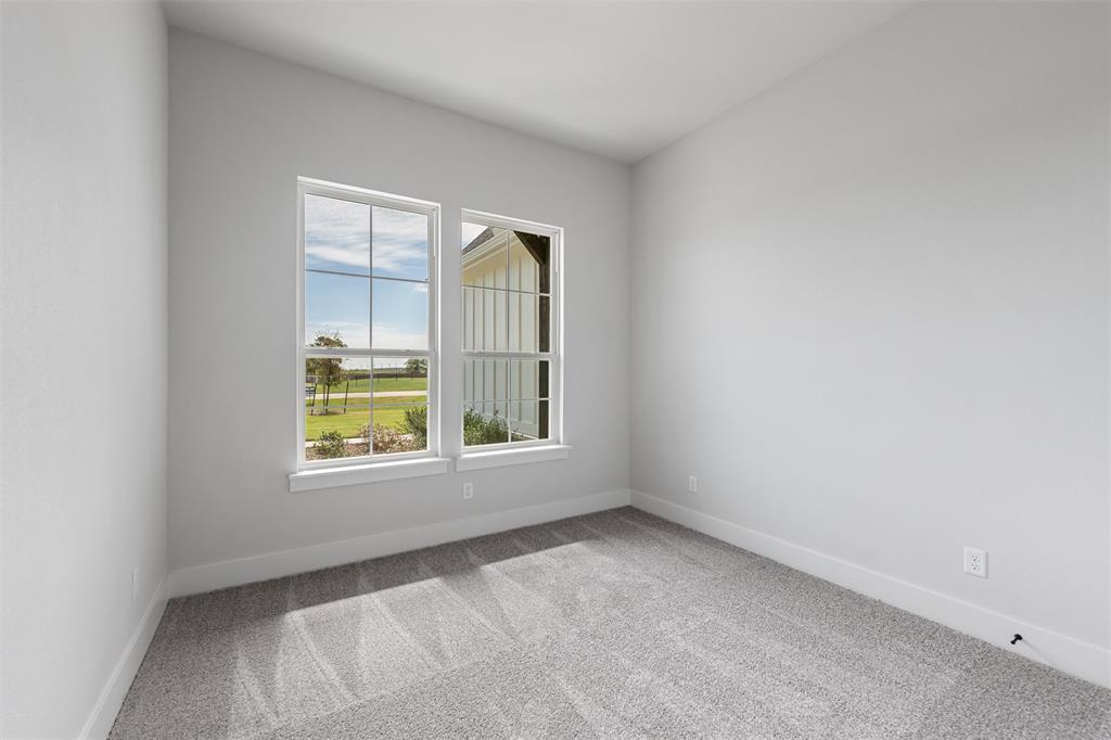 12108 Crystal Drive Krum, TX 76249 - Photo 13 of 40 an empty room with a window