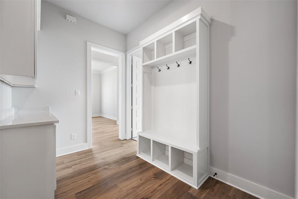 12108 Crystal Drive Krum, TX 76249 - Photo 15 of 40 a view of empty room with wooden floor
