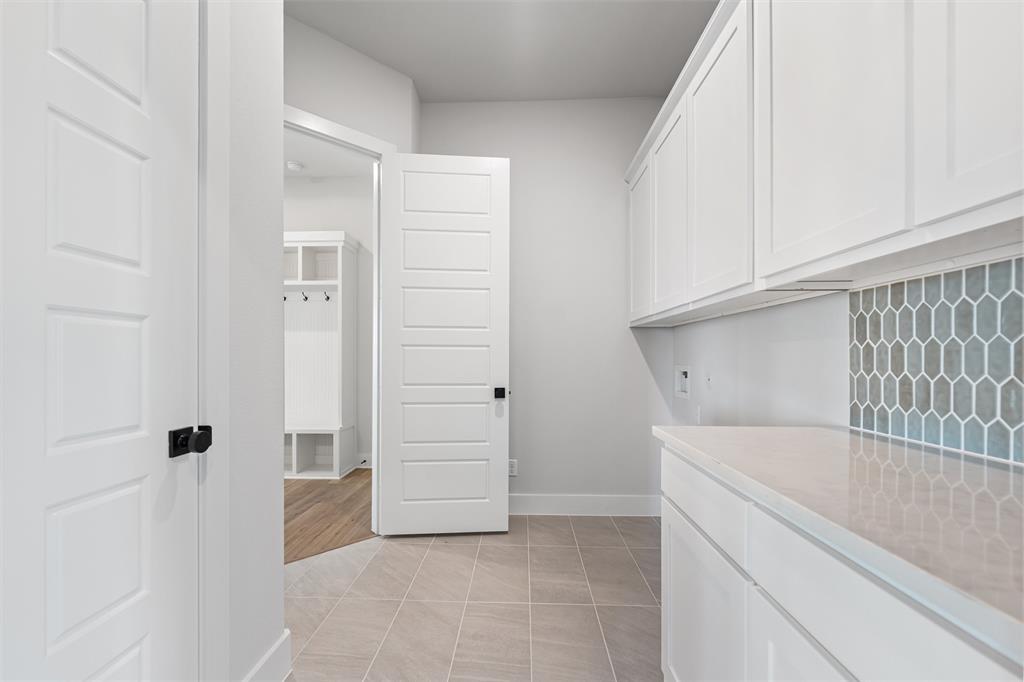 12108 Crystal Drive Krum, TX 76249 - Photo 18 of 40 a bathroom with a tub and shower