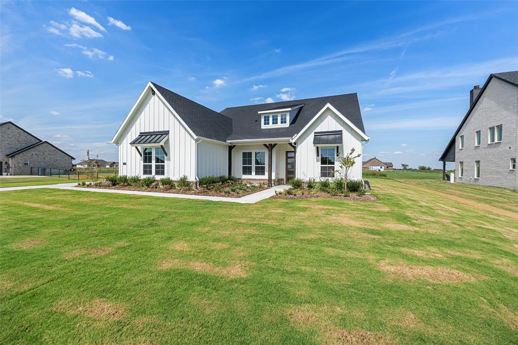 12108 Crystal Drive Krum, TX 76249 - Photo 4 of 40 a front view of a house with a big yard