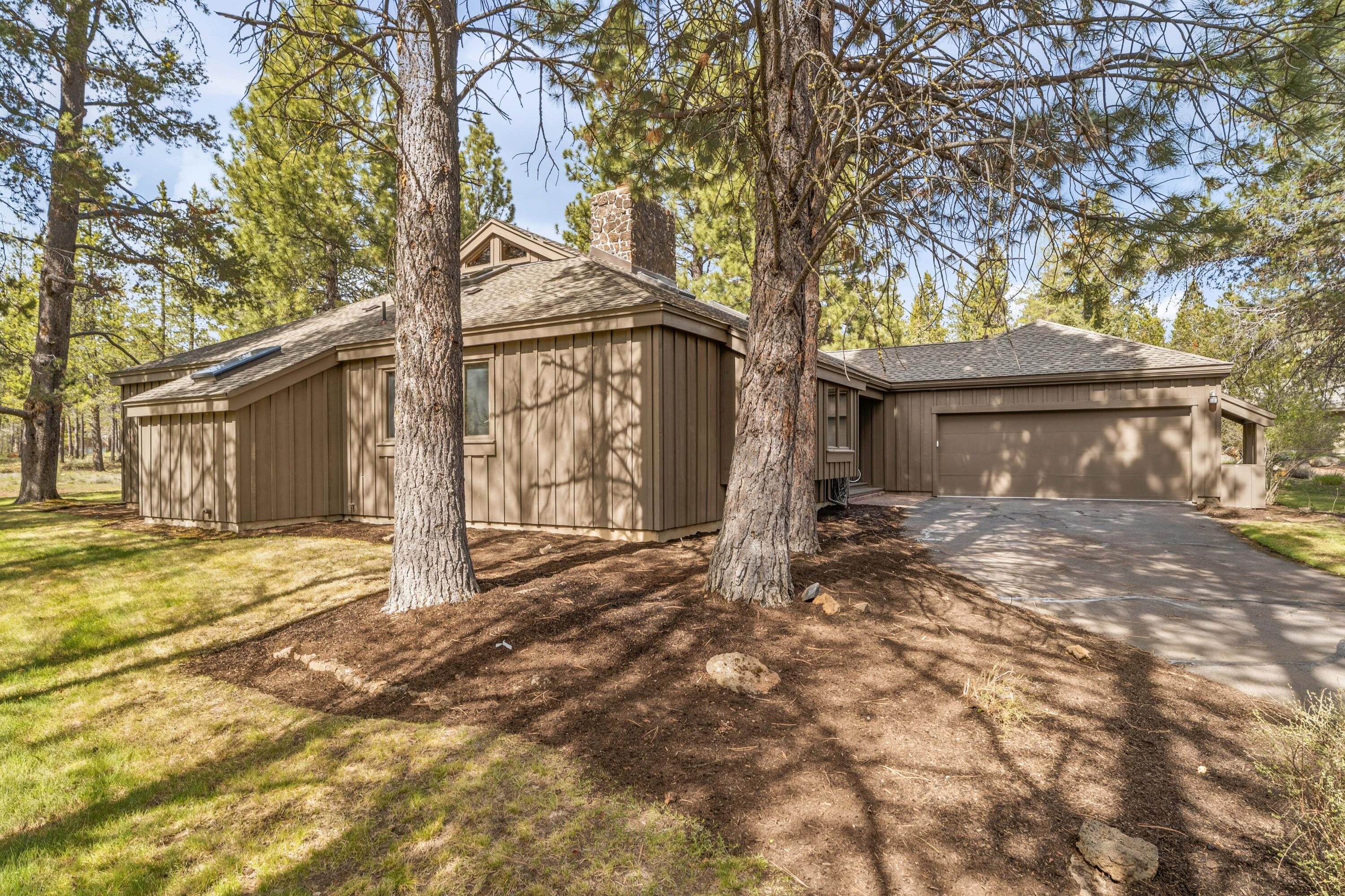 17866 Grouse Lane, Unit 3 Sunriver, OR 97707 - Photo 6 of 61 a view of a house with a yard