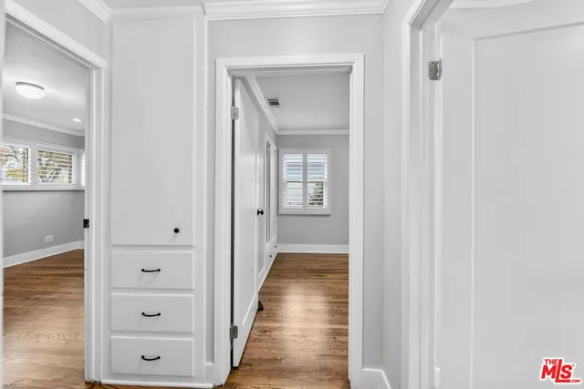 a view of a hallway with closet
