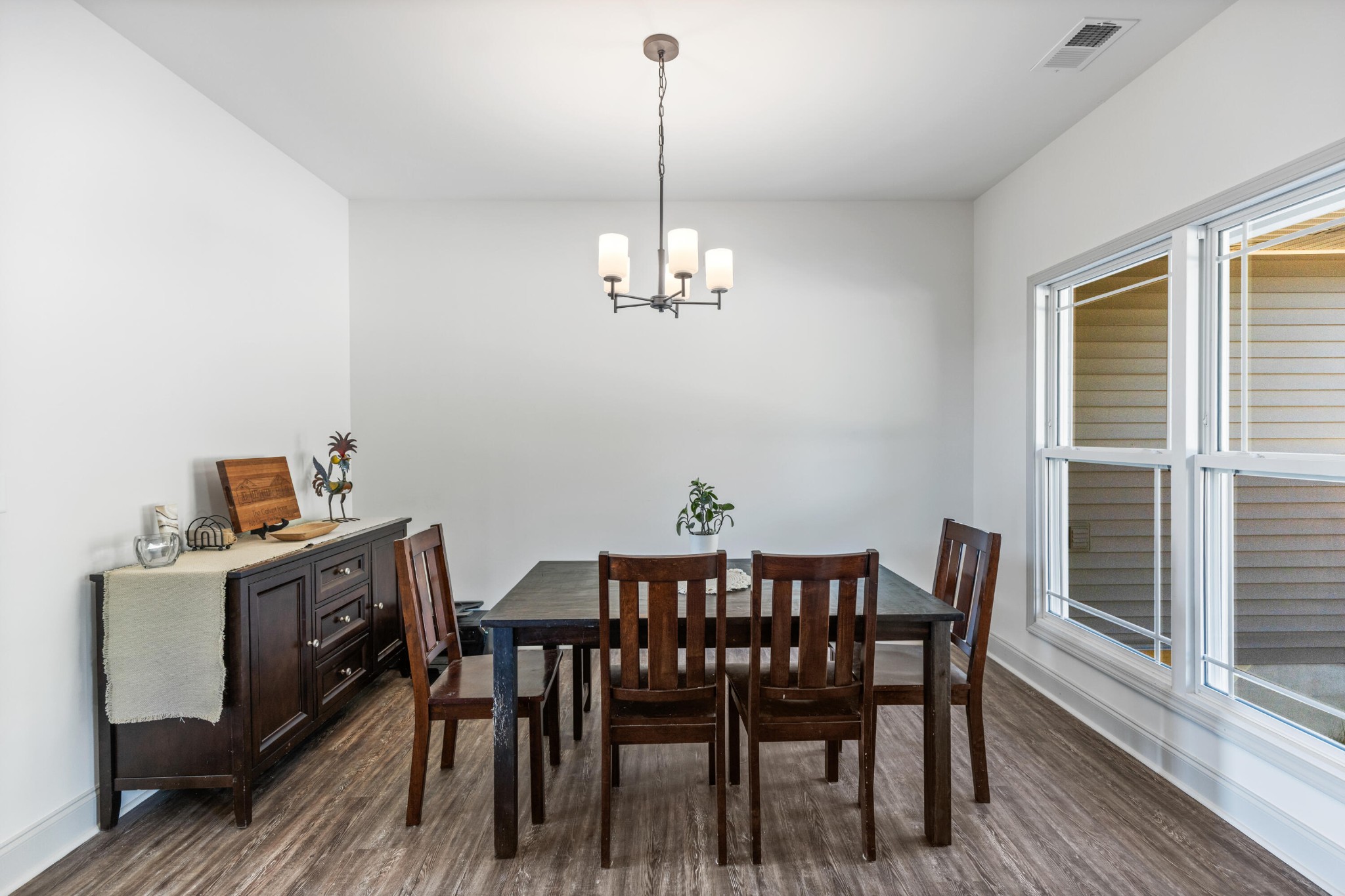 610 Summer City Firetower Road Pikeville, TN 37367 - Photo 17 of 60 a view of a dining room with furniture window and wooden floor