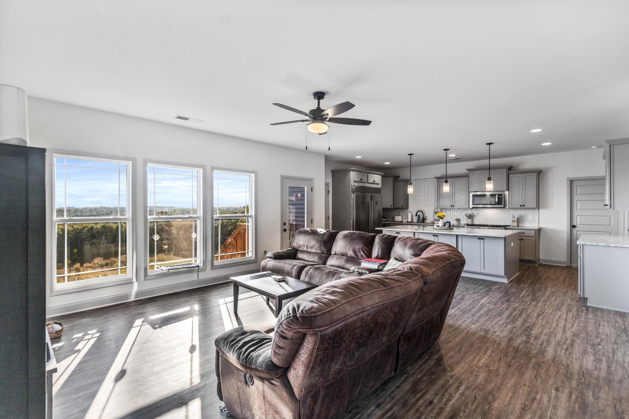 610 Summer City Firetower Road Pikeville, TN 37367 - Photo 23 of 60 a living room with furniture and a large window with kitchen view
