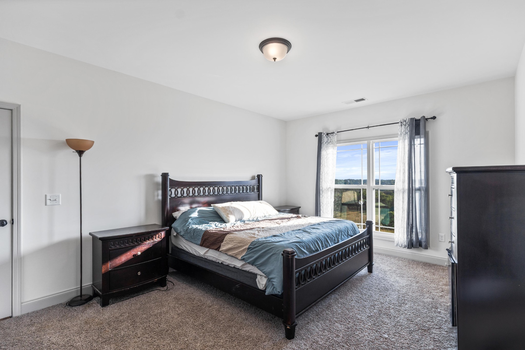 610 Summer City Firetower Road Pikeville, TN 37367 - Photo 25 of 60 a bed sitting in a bedroom next to a window