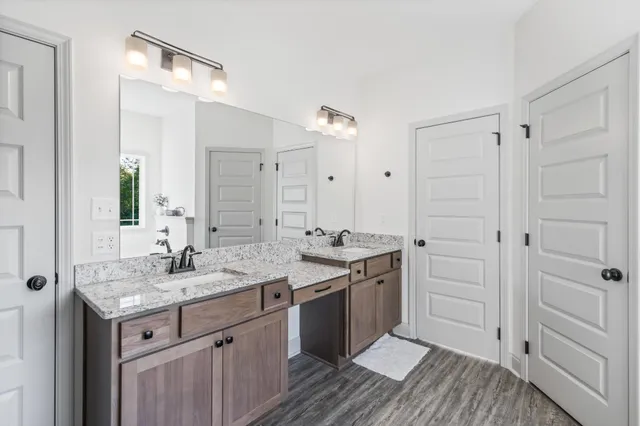 a white bath tub sitting next to a window