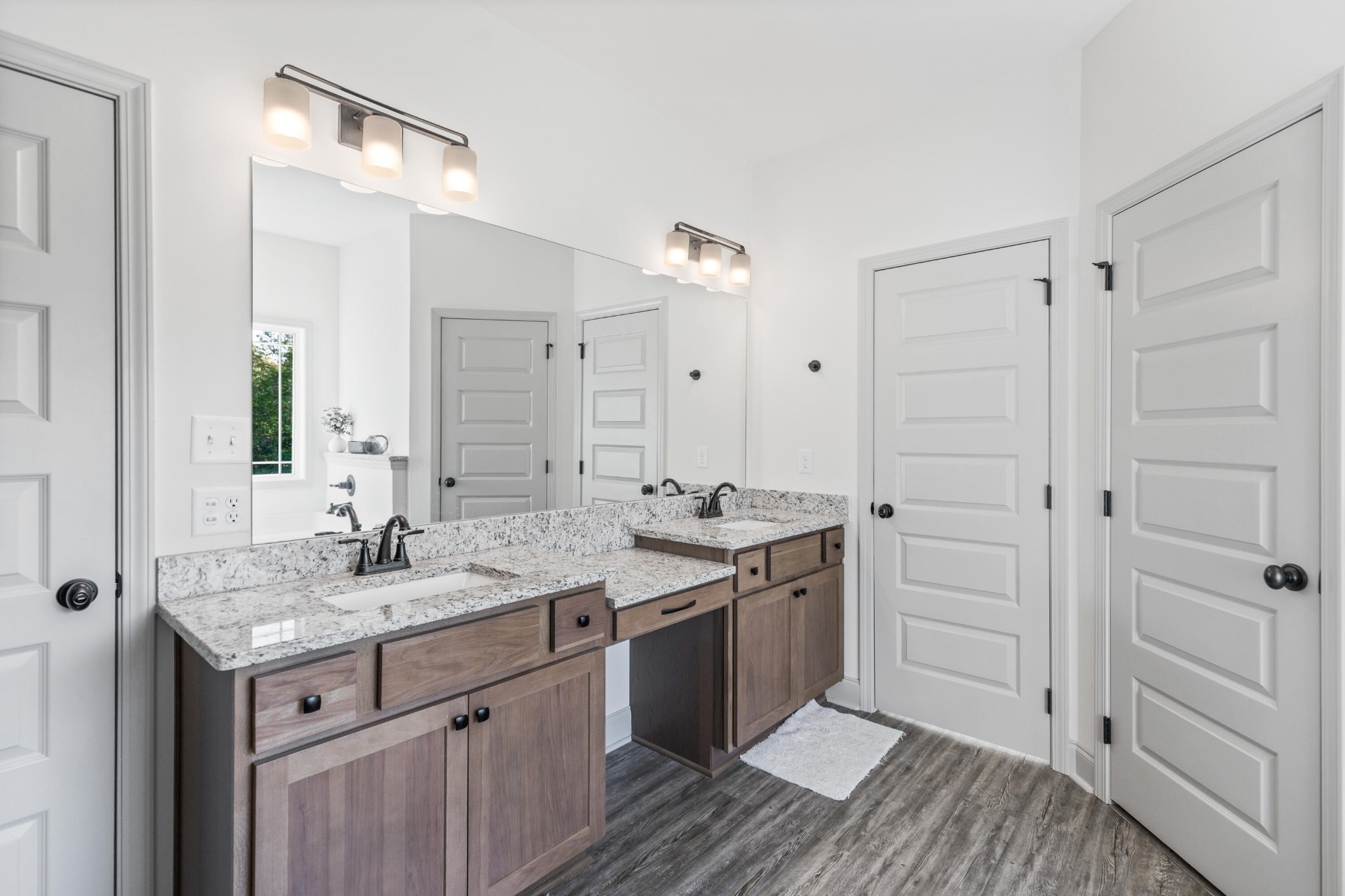 610 Summer City Firetower Road Pikeville, TN 37367 - Photo 27 of 60 a bathroom with a granite countertop double vanity sink and mirror