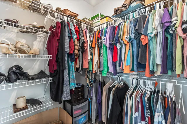 a bathroom with a shower and a glass door