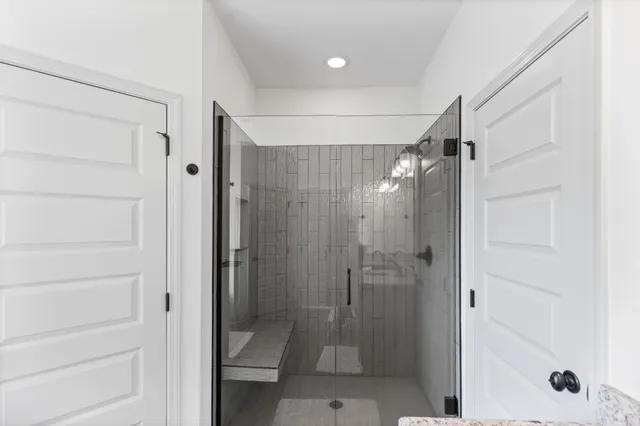 a backyard of a house with lots of green space and mountain view in back