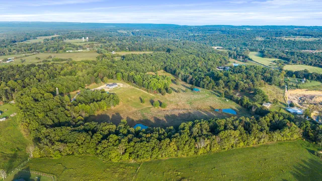a view of lake with green space