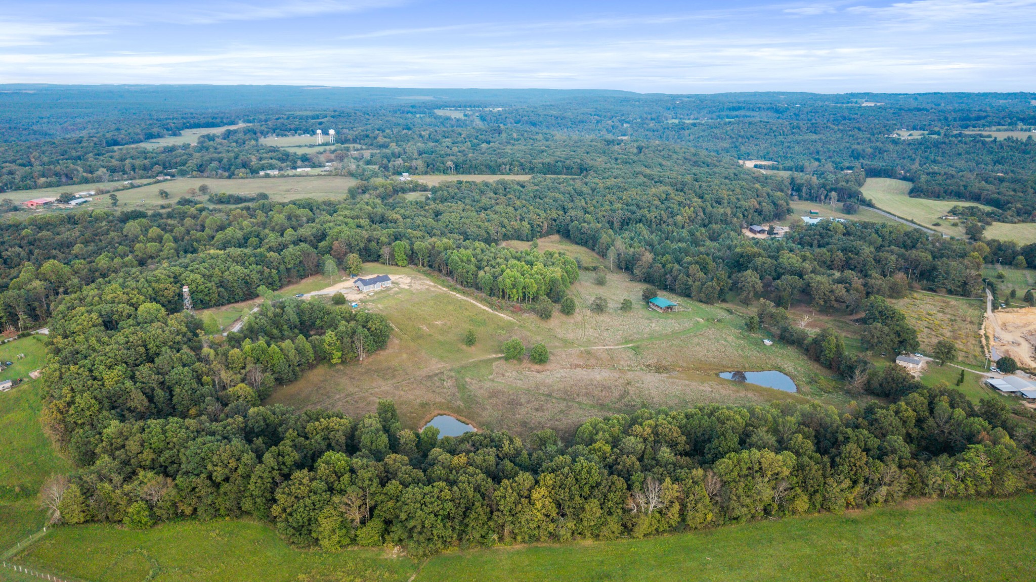 610 Summer City Firetower Road Pikeville, TN 37367 - Photo 56 of 60 an aerial view of residential houses with outdoor space and trees