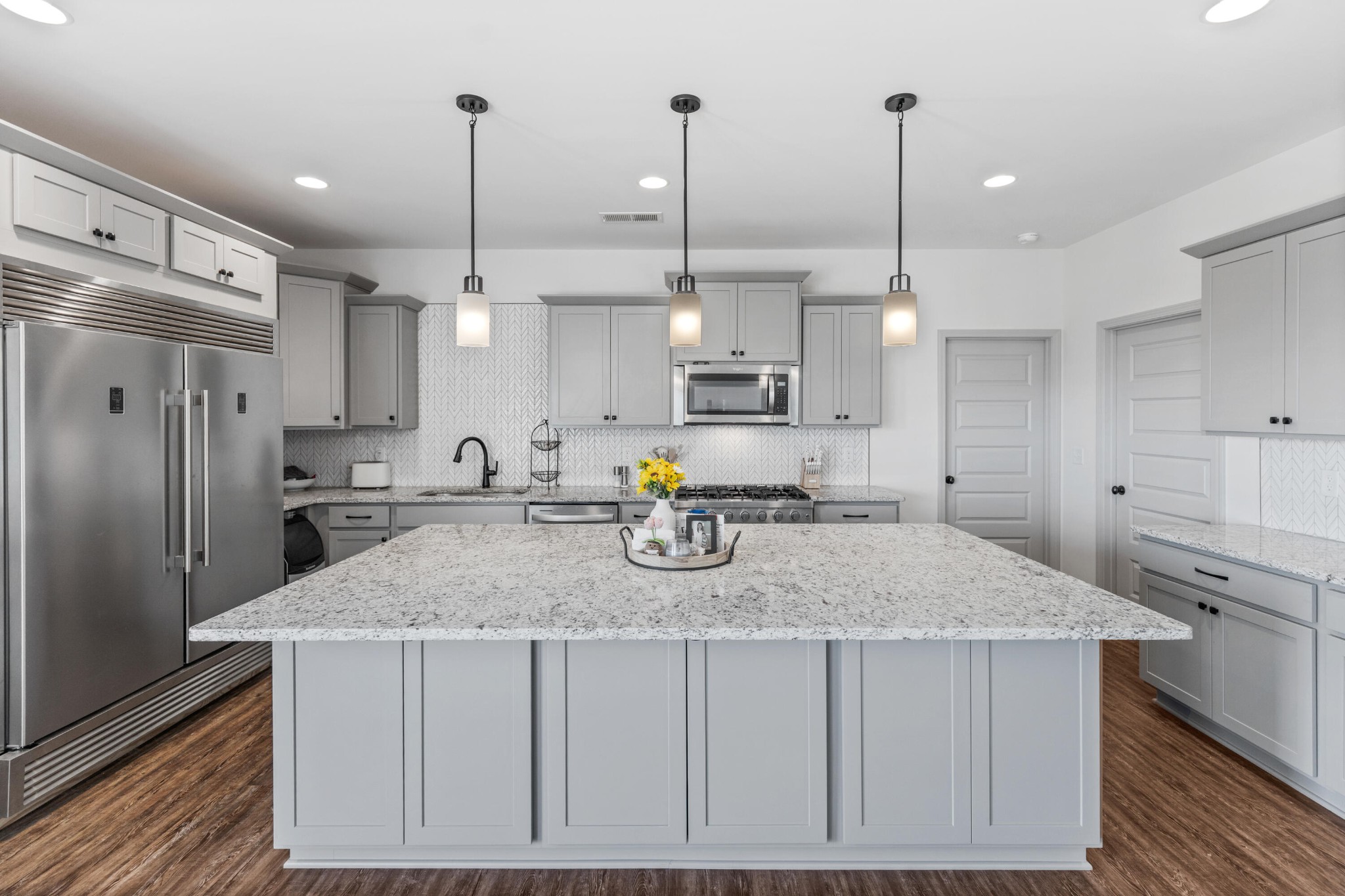 610 Summer City Firetower Road Pikeville, TN 37367 - Photo 6 of 60 a kitchen with stainless steel appliances granite countertop a sink a stove and refrigerator