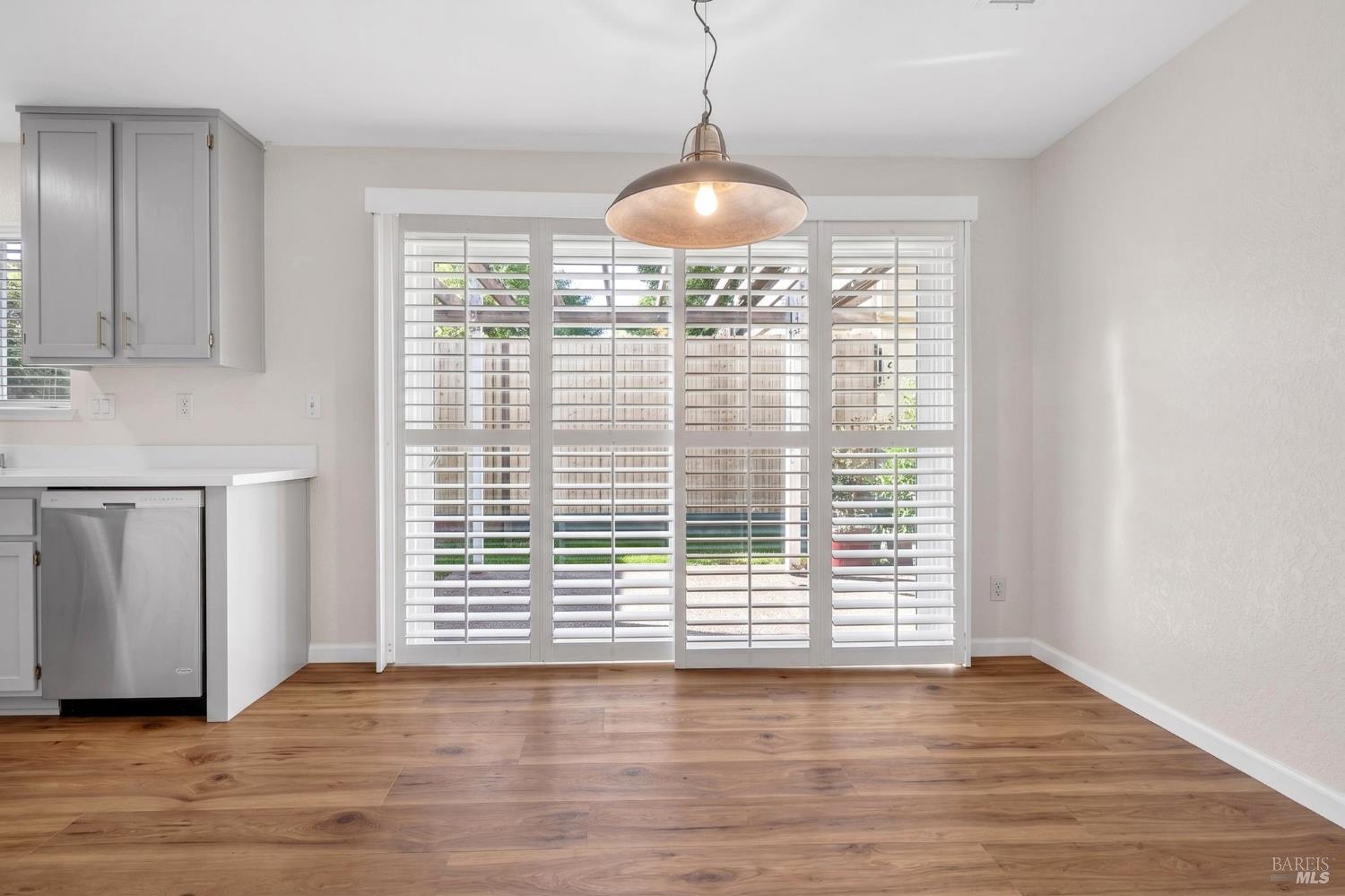 2757 Lakeview Drive Santa Rosa, CA 95405 - Photo 5 of 54 a view of a room with wooden floor and a window