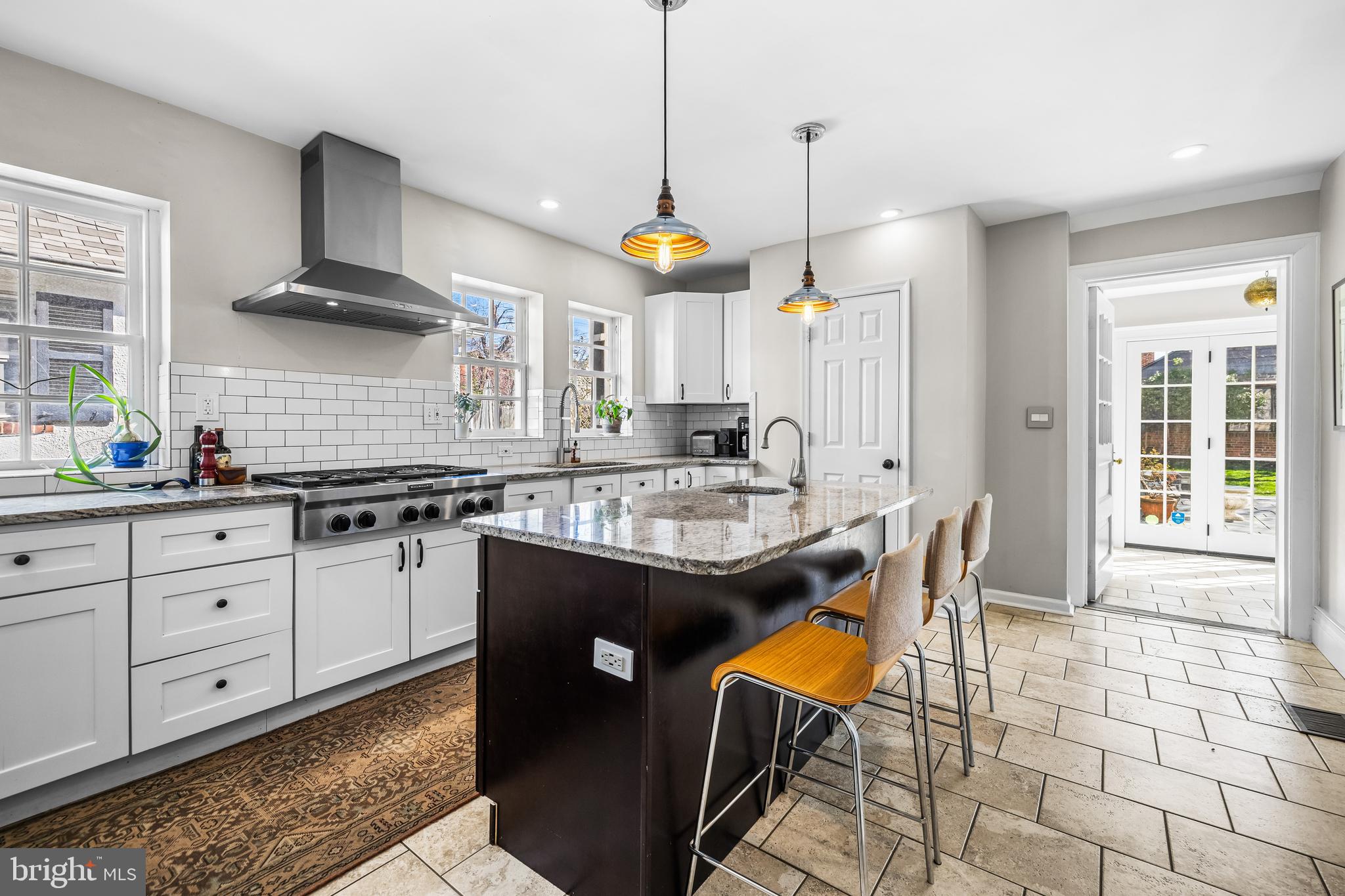 4415 Norwood Road Baltimore, MD 21218 - Photo 5 of 83 a kitchen with stainless steel appliances granite countertop a sink a stove and a wooden floors