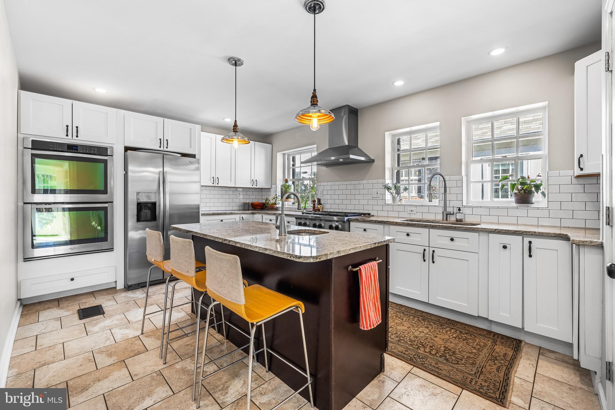 4415 Norwood Road Baltimore, MD 21218 - Photo 6 of 83 a kitchen with stainless steel appliances granite countertop a stove a sink and a refrigerator
