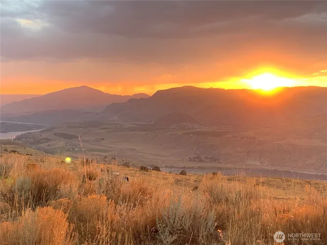 a view of lake with mountain