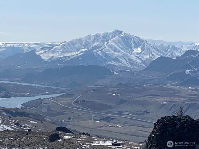 a view of a house with a mountain