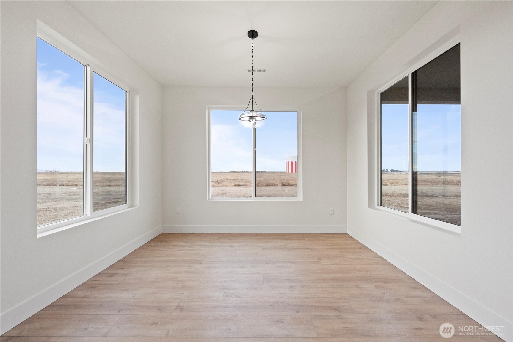 1269 E Mount Othello, WA 99344 - Photo 14 of 32 a view of an empty room with a window